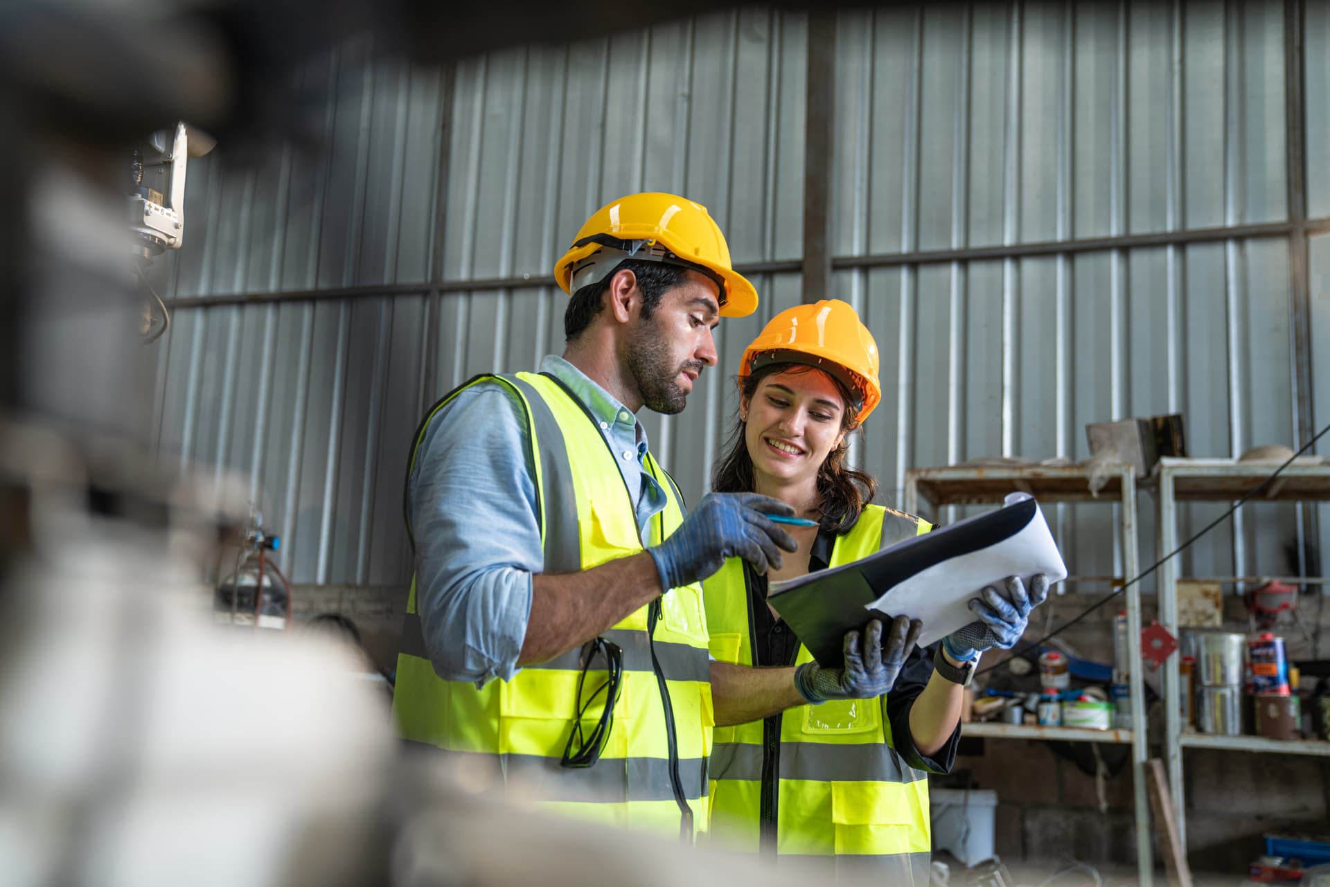 Engineering team working in an industrial manufacturing facility